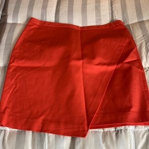NWOT Banana Republic orange/coral skirt with crossover accent on front. Sz 14
